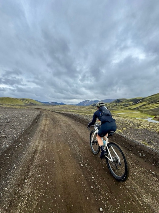 Riding a gravel road through the Icelandic highlands during The Rift 140k